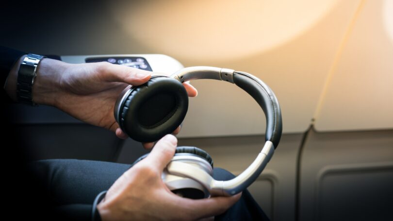 Noise Cancelling Headphones Passenger On Plane
